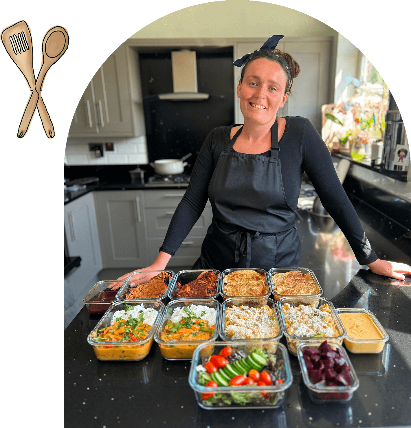Woman smiling with jars of colorful vegetables.